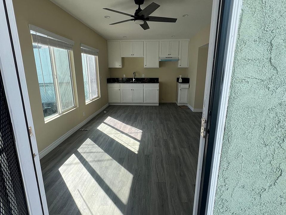 Front entrance into the living room and kitchen