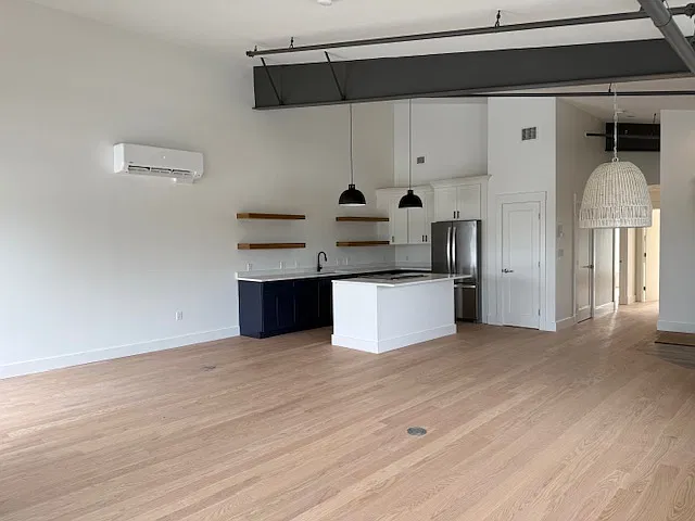 Combo Living Area/Kitchen. Clean, brand new and bright with natural light