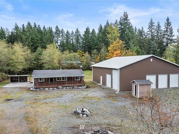 Wonderful almost 2.5 acre property with HUGE shop!