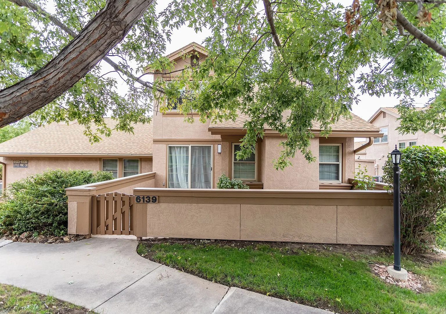 Impeccably Maintained End Unit Townhome with 2-Car Garage: Effortless Comfort & Convenience Await! — Photo 1