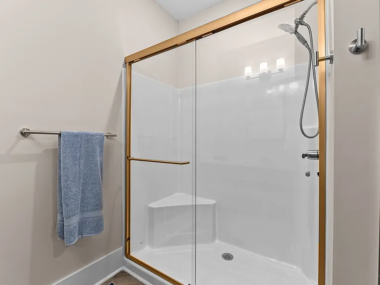 Active Adult Bathroom with shower with a glass door