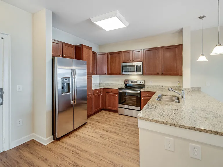 Open-concept kitchens with granite counters and custom cabinetry