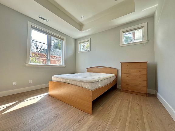 huge bedroom with high ceiling