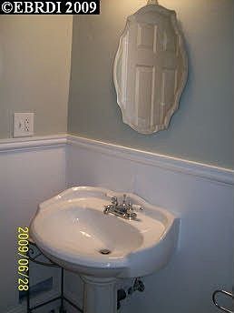 Antique clawfoot tub, custom mosiac travertine tilework