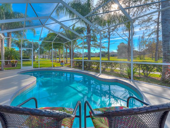 Sip a cool beverage poolside