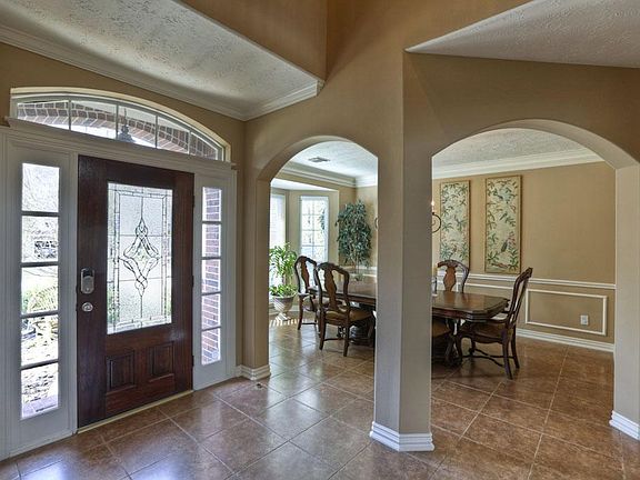 Tile runs throughout all of first floor except for the master bedroom.