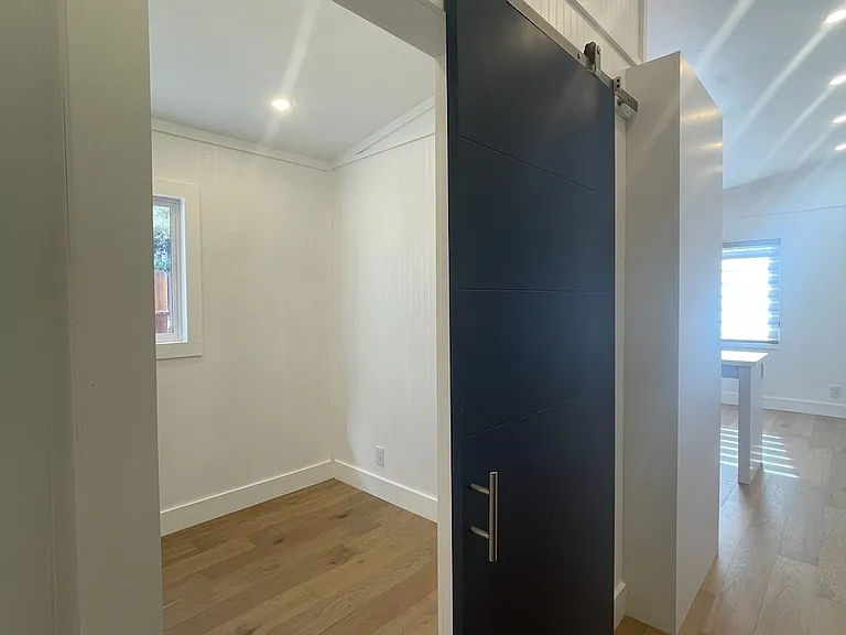 Barn door privacy for office/study.