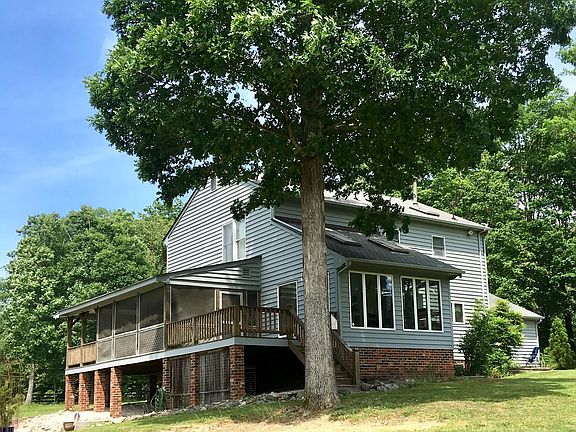 Huge sunroom with gorgeous sunsets.
