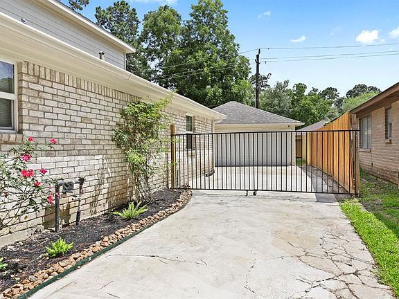 At the back of the property, the oversized garage has space for 2 cars and a workbench. For added convenience you have a storage building behind the garage for safe keeping of your lawn equipment, camping gear, bikes and more.