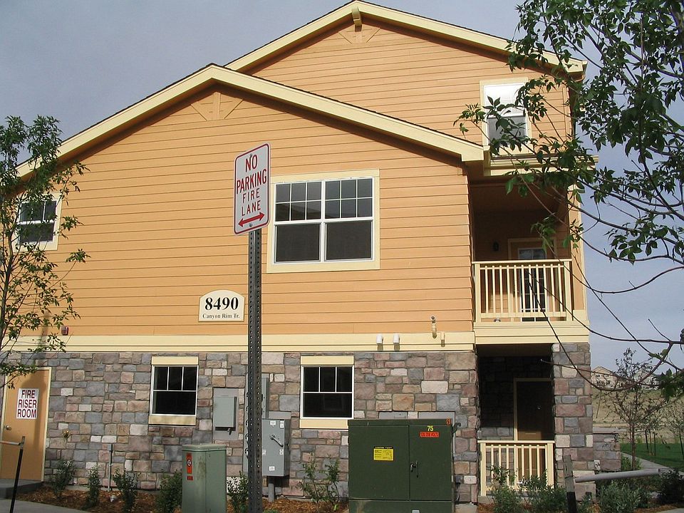1st floor entry with porch and 2nd story deck