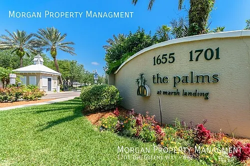 1701 The Greens Way Photo 1
