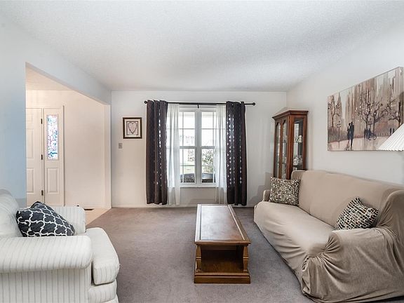 Formal living room off entry foyer.