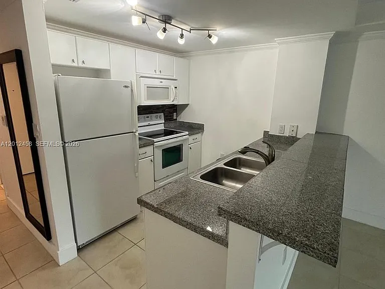 2740 SW 28th Ter #203 — Photo 8