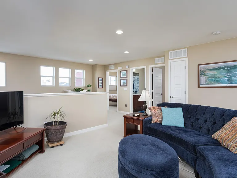 Expansive, versatile loft, adjacent to the laundry room and 3 upper bedrooms