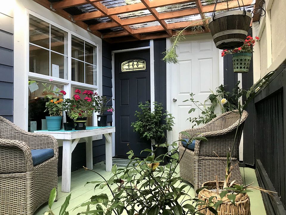Separate entry with covered deck leading to downstairs office/suite