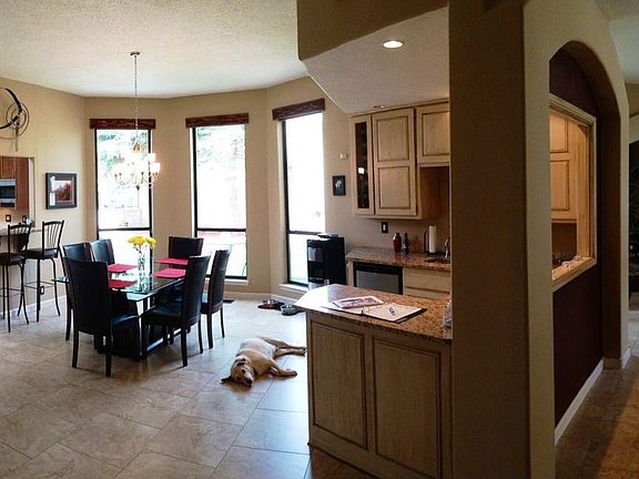 4th image of 11525 Woodmar Ln NE