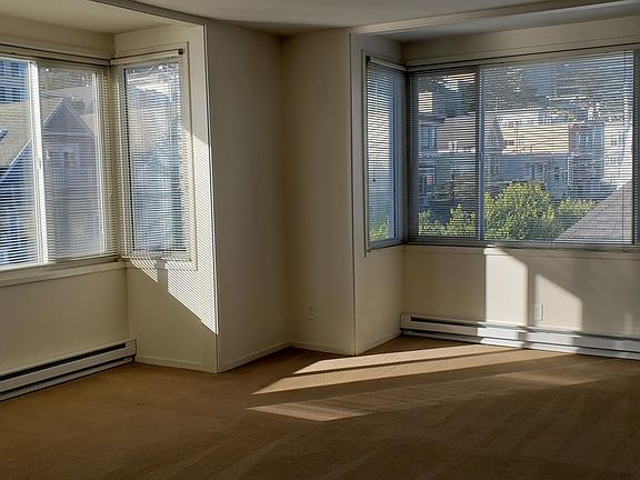 3rd floor, sunny living room, corner unit