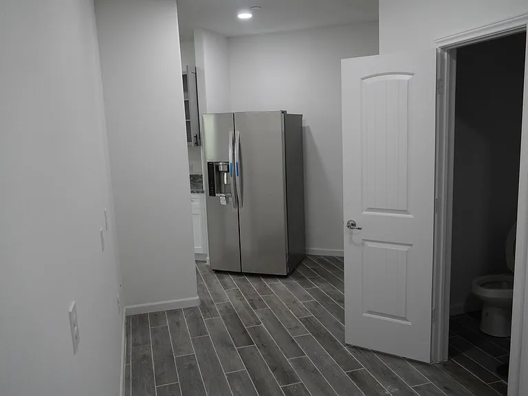 Unit E Internet workspace, Frig, & half bath