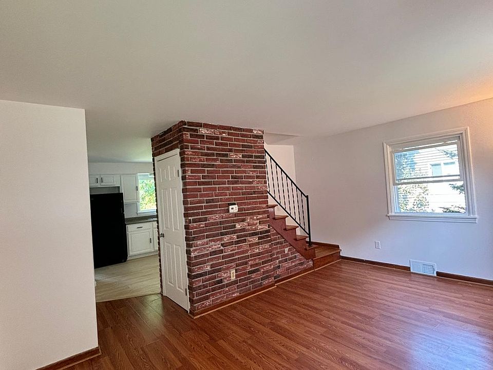 Living room area leading to the kitchen