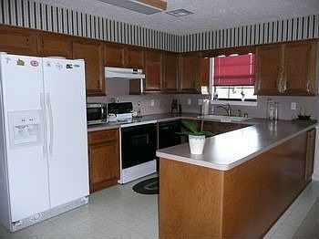 Kitchen with loads of cabinets