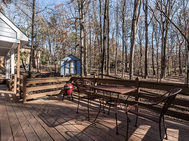 Large deck has been recently re-stained since this photo was taken. A sweet sit spot to enjoy the beauty and quiet of this backyard