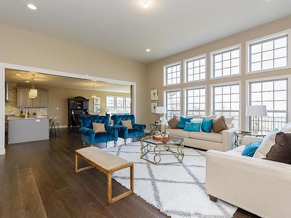 Great Room with 12 Foot Ceilings and a Wall of Windows