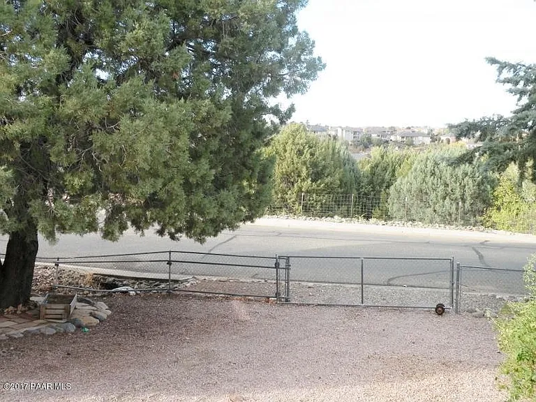 Rear gate to access backyard. Parking available for RV or Boat storage.