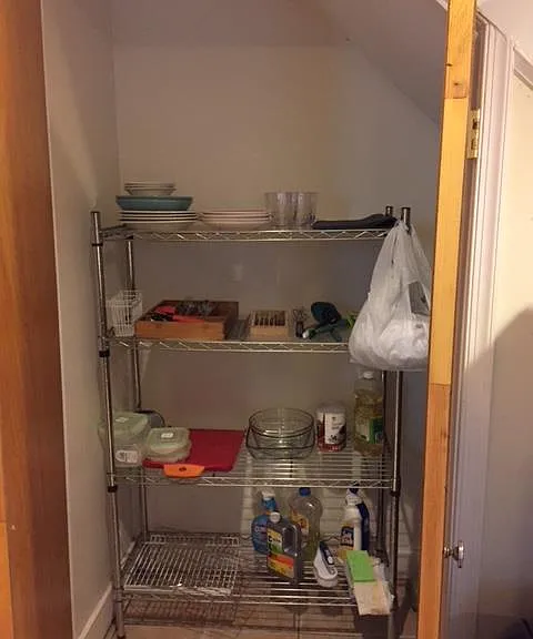 Pantry for dishes, glasses and silverware.
