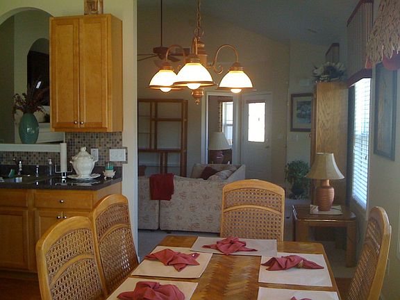 Breakfast area is open to sunroom and living area for ultimate entertaining.