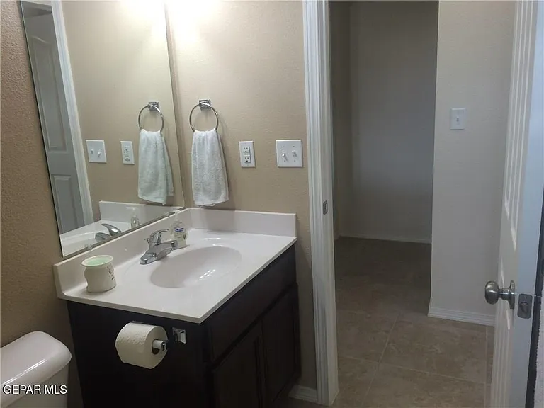 7008 Faxon Dr — Photo 8