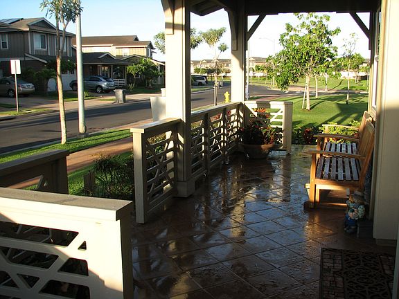 Tiled front porch and sidewalk