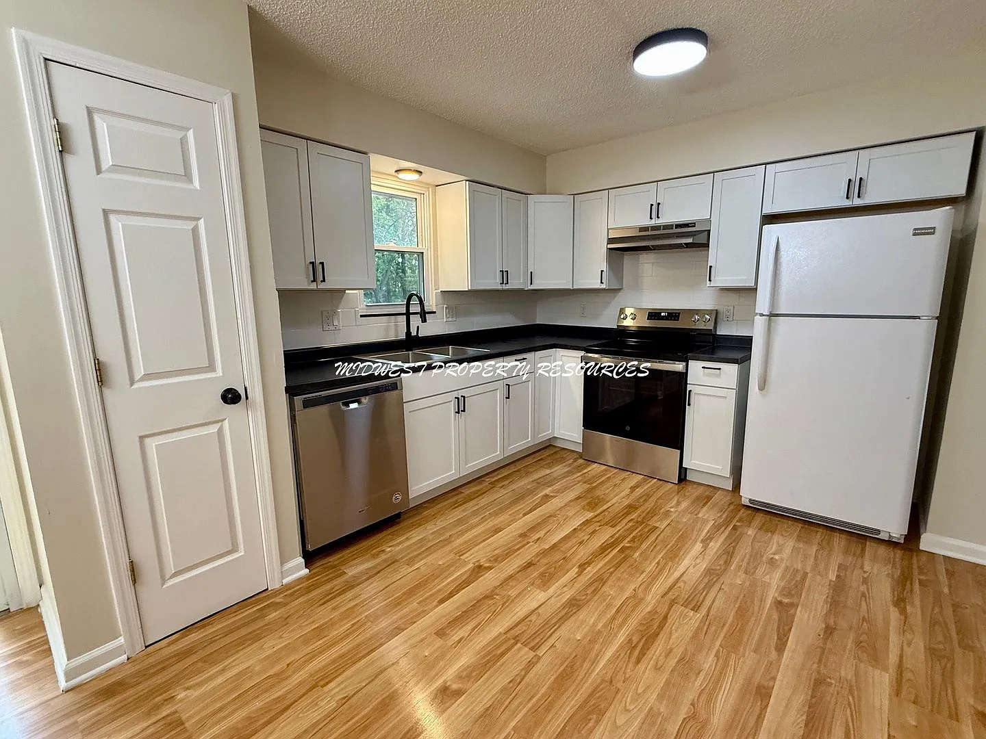 Beautifully Updated 3-Bedroom Home with Finished Basement & Private Backyard — Photo 4