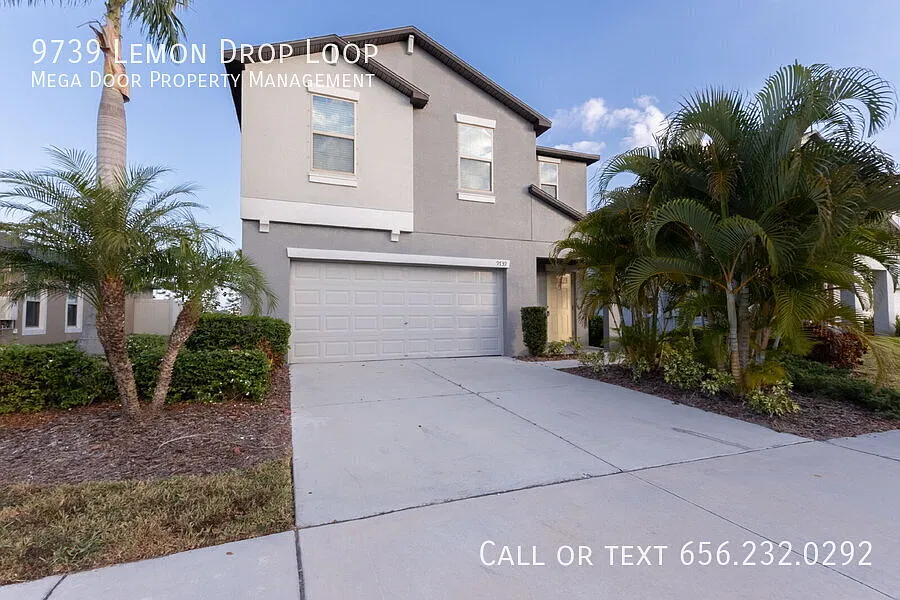 Bright 4BR Home with Open Layout & Garage in Belmont West — Photo 2