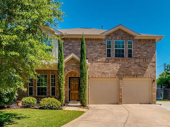 Cul-de-sac location allows for wide lot and extra parking was added right of the original driveway.