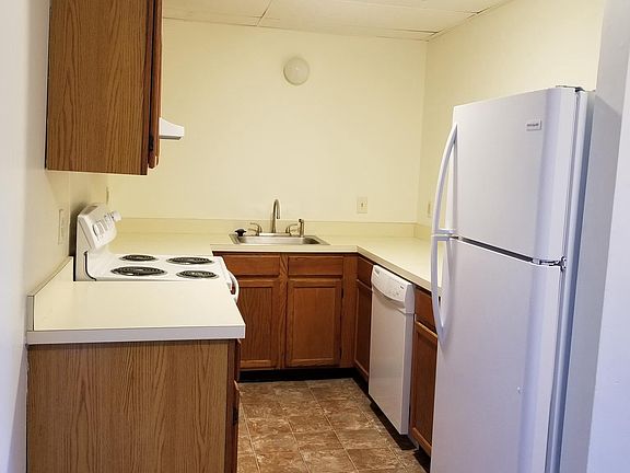 GALLEY KITCHEN HAS BRAND NEW ELECTRIC STOVE & FRIDGE