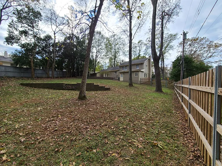 Well-built fence and an amazing back yard for kids and pets.