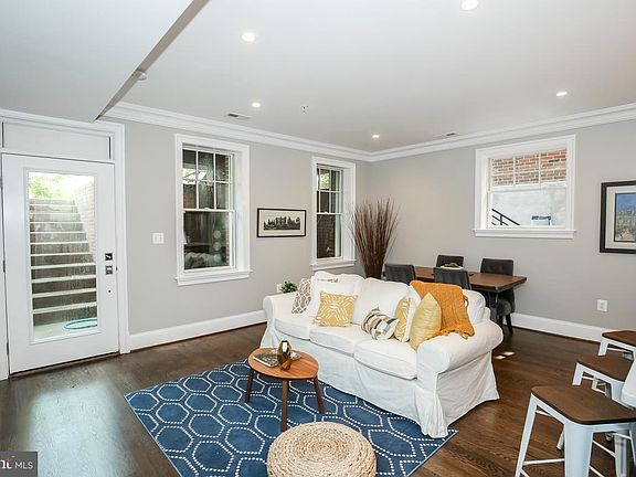 Living and dining; front entrance. Note: This unit is not basement unit, it is ground-level.