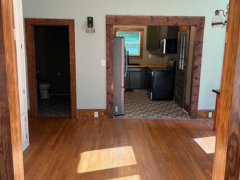 View from front room to Dining Area/Kitchen