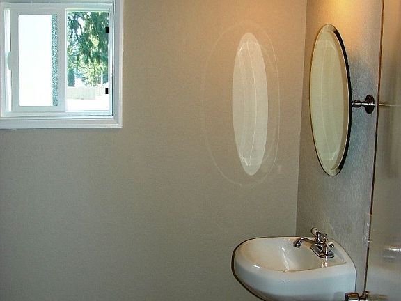 3/4 utility area renovated bathroom 