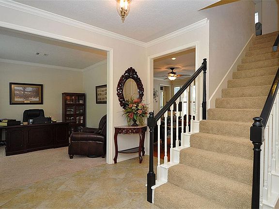 TO THE LEFT OF THE ENTRY IS THE STUDY