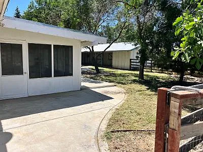 Building Photo - 6825 N Locan Ave