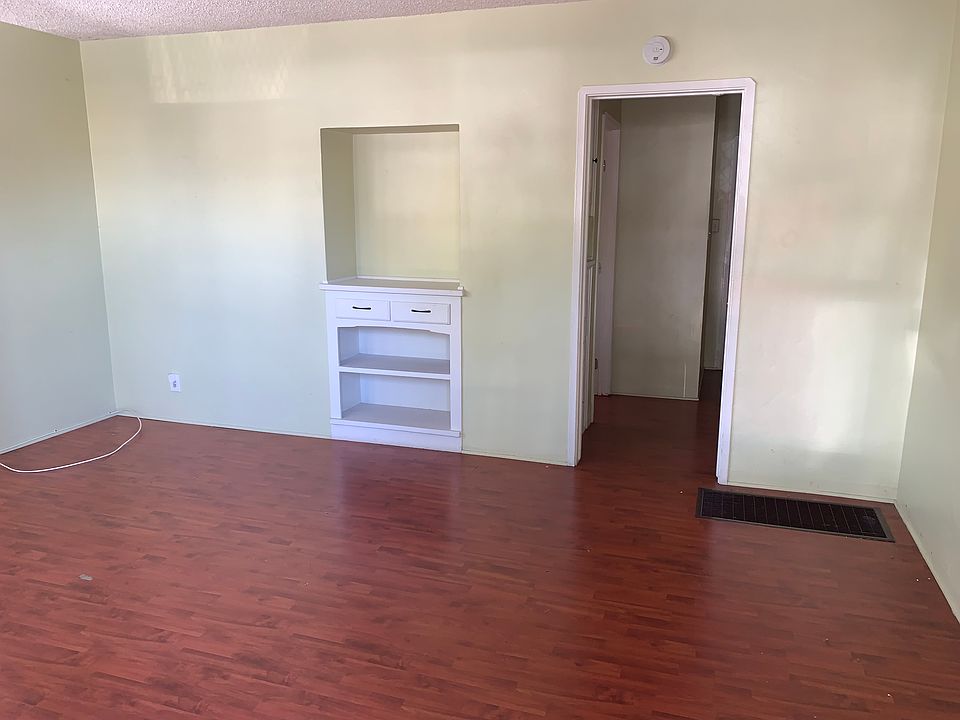 living room with built in cabinets