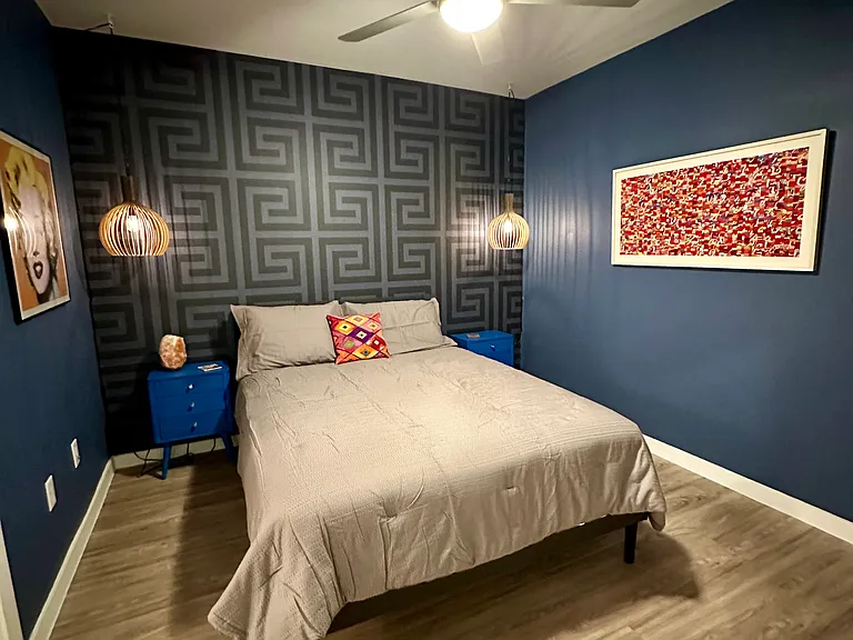 Master bedroom with large tv