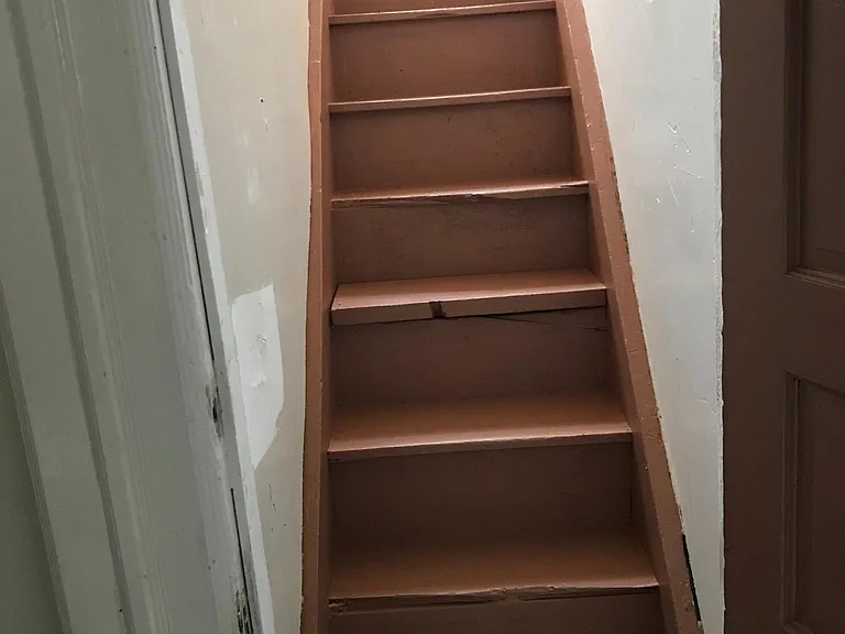 Private staircase to upper bedroom