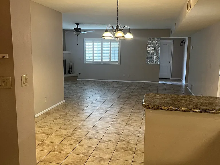 view from kitchen with dining room and then living room (open floor plan)