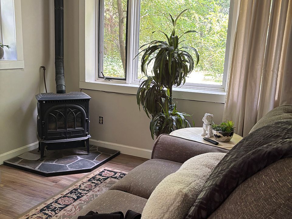Living room, propane stove, oversized window