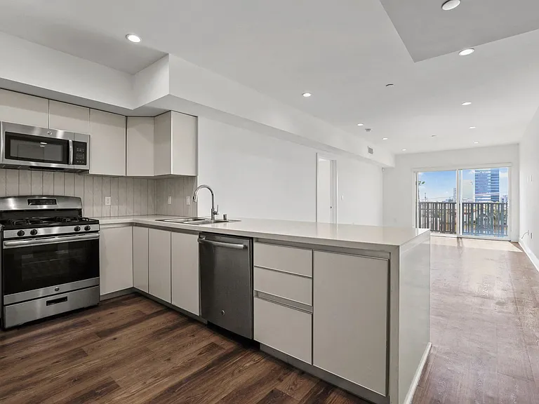 Open-Concept Kitchen, Dining, And Living Room Space