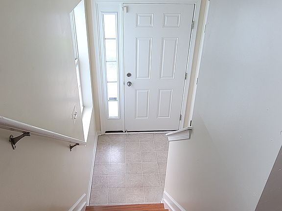 Front dr Entrance and Stairway to 2nd fl