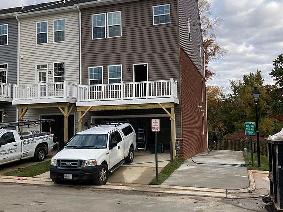 two car garage, with two parking spaces on driveway