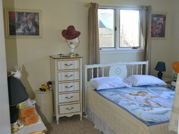 The main hallway leads you down to a full bath and 3 bedrooms.  The bedroom have nice closets and easy access to the full bath.  The windows look out over the yard.